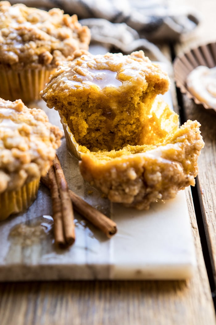 cut in half photo of Pumpkin Coffee Cake Muffins with Cinnamon Honey Butter