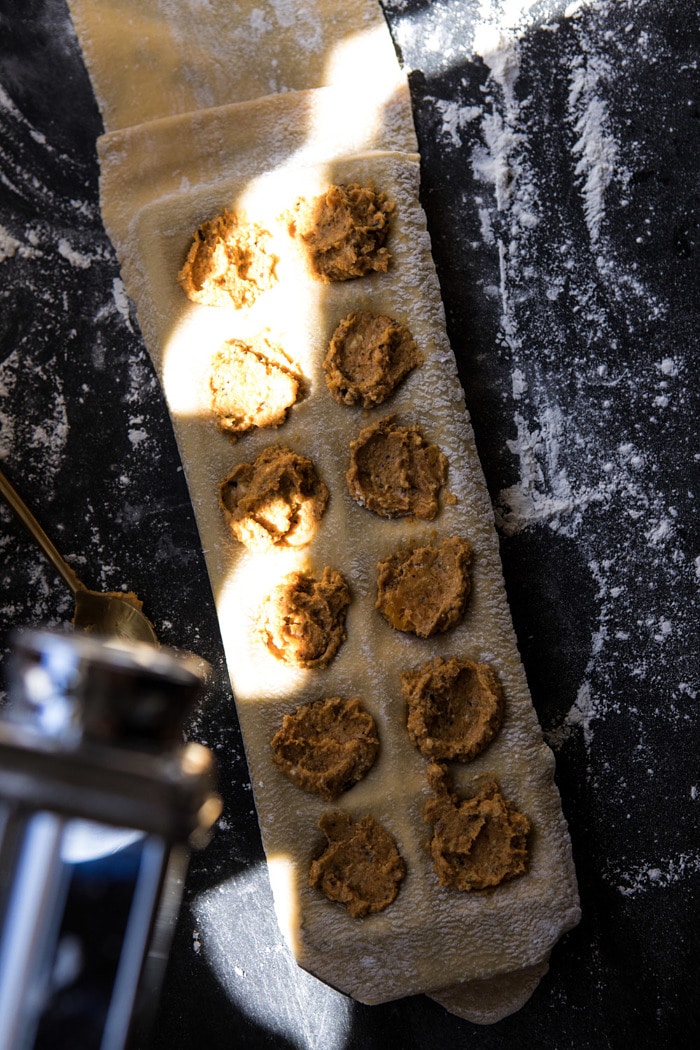 overhead photo of Butternut Squash Cheese Ravioli in ravioli mold