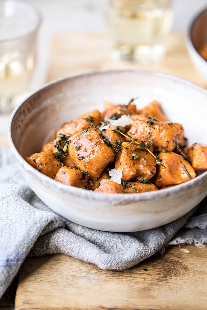 close up photo of Sweet Potato Gnocchi with Herbed White Wine Pan Sauce in bowl 