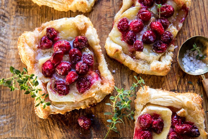 horizontal photo of Cranberry Brie Pastry Tarts