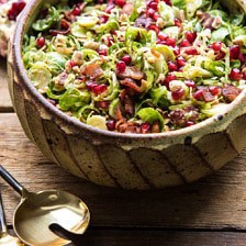 Shredded Brussels Sprout Bacon Salad with Warm Cider Vinaigrette | halfbakedharvest.com #brusselssprouts #salad #thanksgiving #fall #winter #healthy