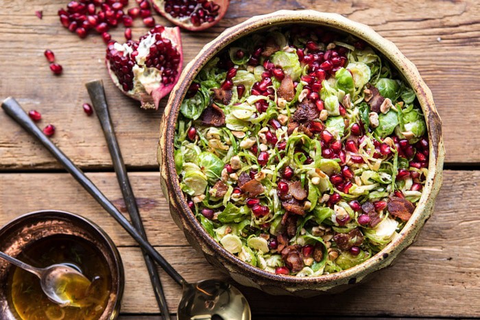 horizontal overhead photo of Shredded Brussels Sprout Bacon Salad with Warm Cider Vinaigrette