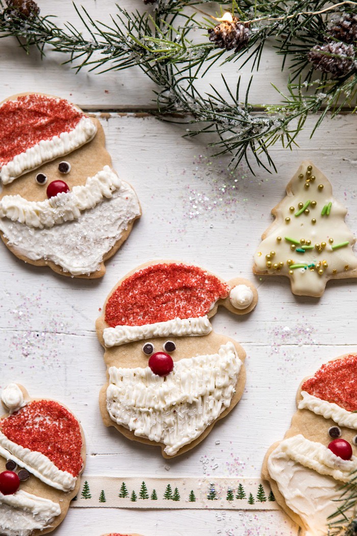 overhead close up photo of Chai Spiced Santa Cookies with White Chocolate Frosting