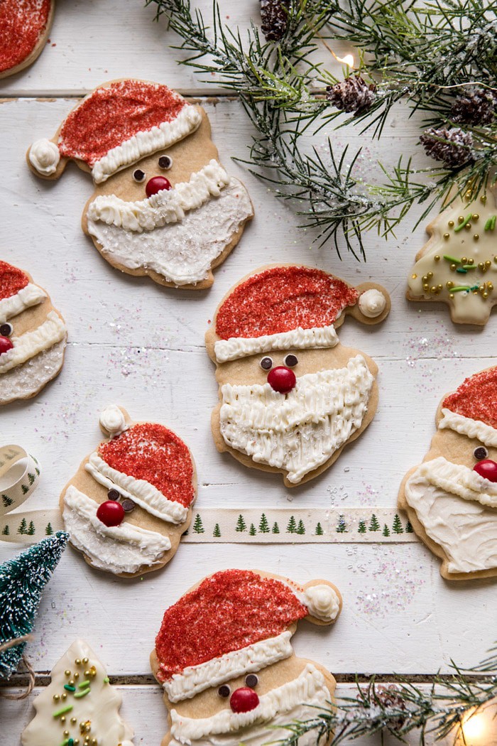 overhead photo of Chai Spiced Santa Cookies with White Chocolate Frosting