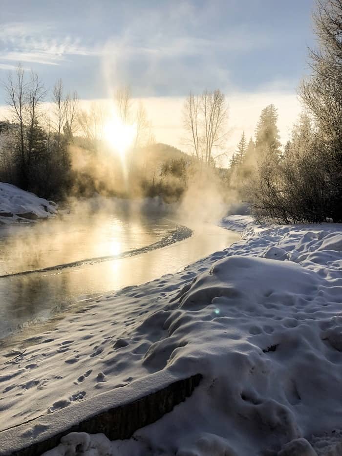 steam coming off the stream with sun in background