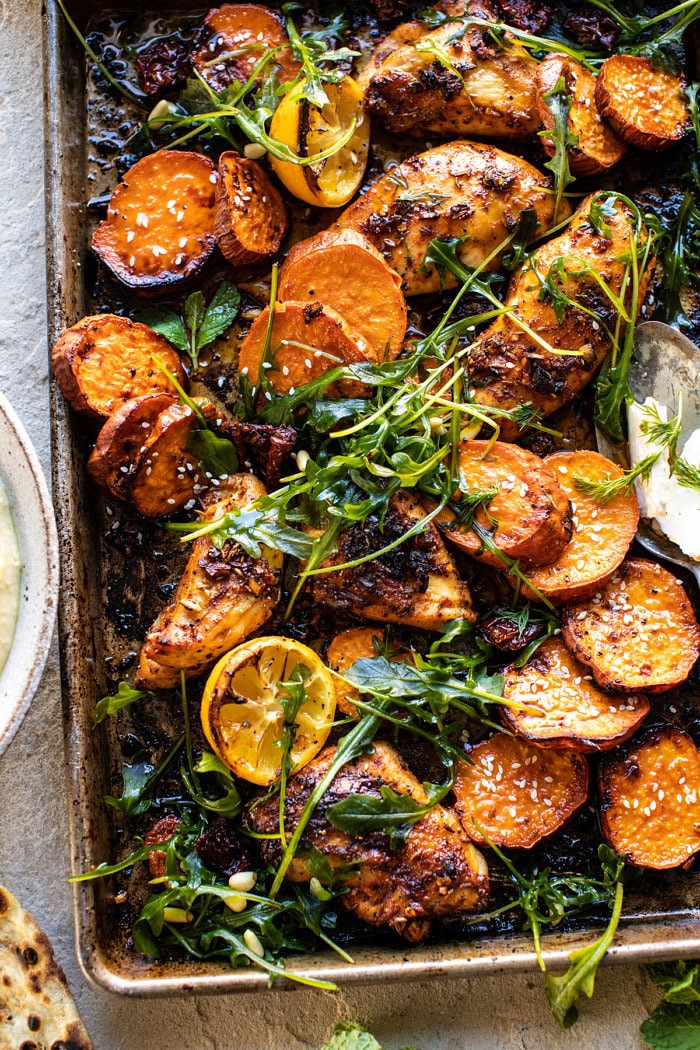 overhead close up photo of Sheet Pan Chicken Shawarma with Sesame Sweet Potatoes on baking sheet