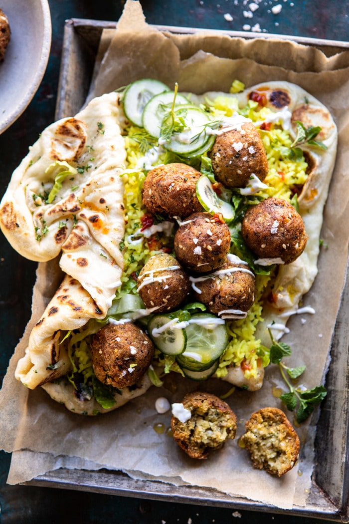 overhead close up photo of Falafel Naan Wraps with Golden Rice and Special Sauce 
