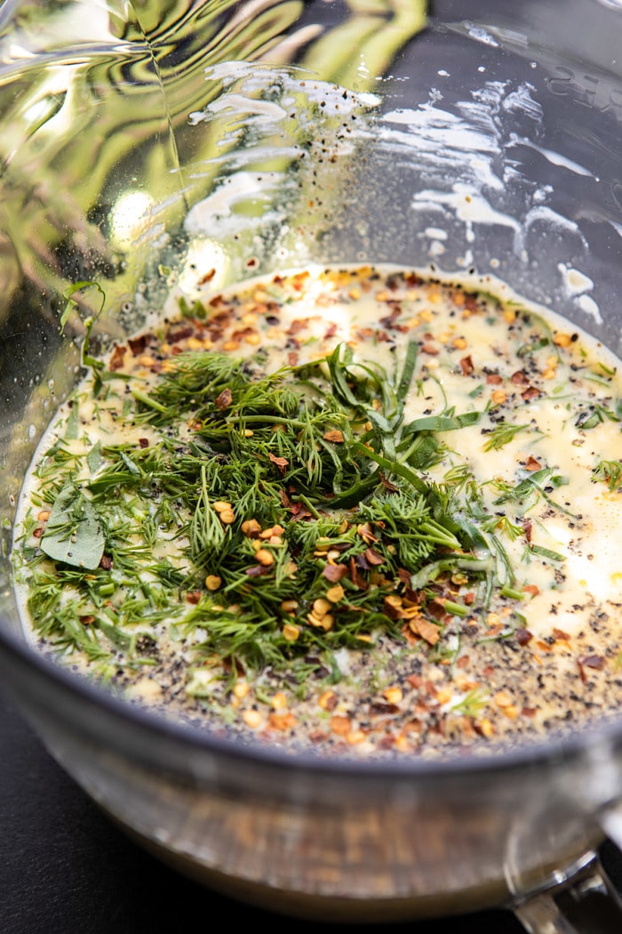 egg batter with herbs in bowl