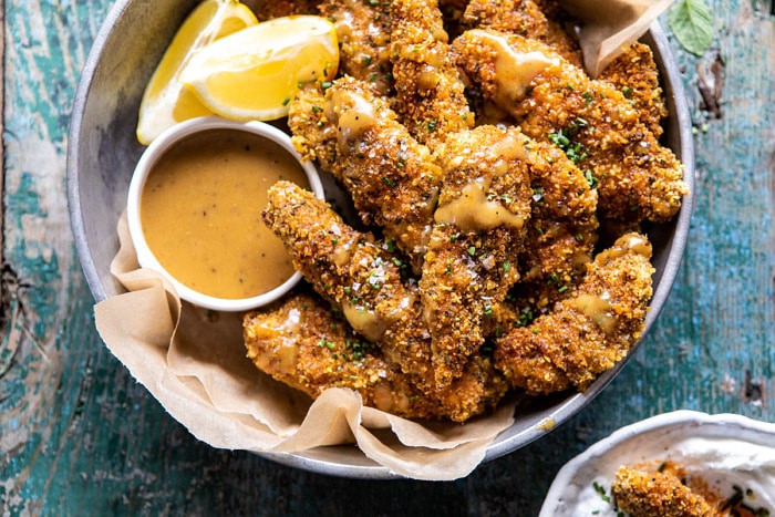 horizontal photo of Baked Black Pepper Ranch Chicken Fingers with Honey Mustard 