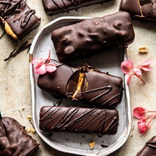 Chocolate Covered Creamy Peanut Butter Cup Bars | halfbakedharvest.com #vegan #chocolate #peanutbutter #dessert