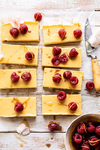 Creamy Lemon Bars with Browned Butter Raspberries.