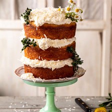 Lemon Coconut Naked Cake with Whipped Vanilla Buttercream | halfbakedharvest.com #coconutcake #springrecipes #easter #cake #layercake