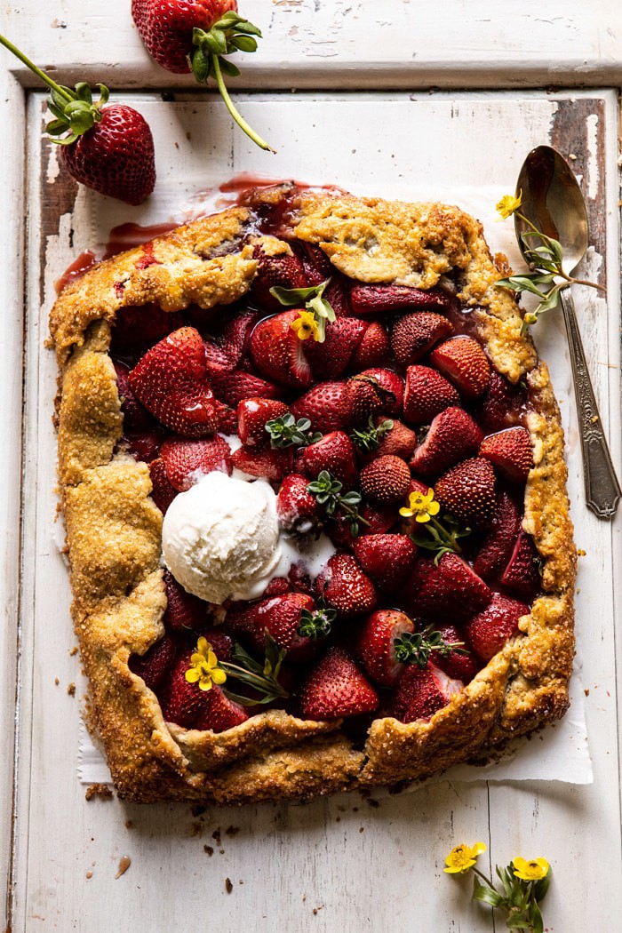 overhead photo of Jammy Strawberry Galette with ice cream on top of galette 