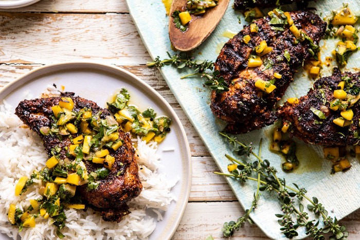 horizontal photo of Tropical Jerk Grilled Chicken with Charred Mango Salsa Verde 