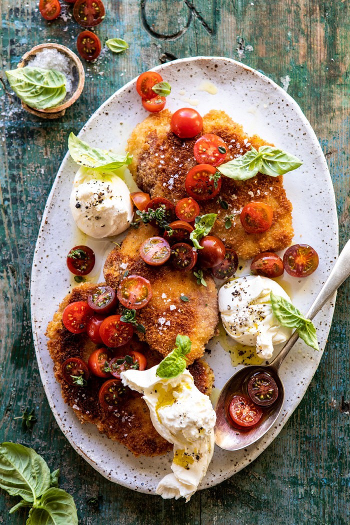 overhead photo of Basil Chicken Saltimbocca with Marinated Tomatoes and Burrata on platter 