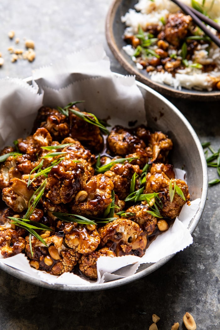 side angled close up photo of Better Than Takeout Kung Pao Cauliflower in serving bowl 