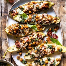 Spicy Chickpea and Cheese Stuffed Zucchini | halfbakedharvest.com #healthy #easyrecipes #summerrecipes #zucchini