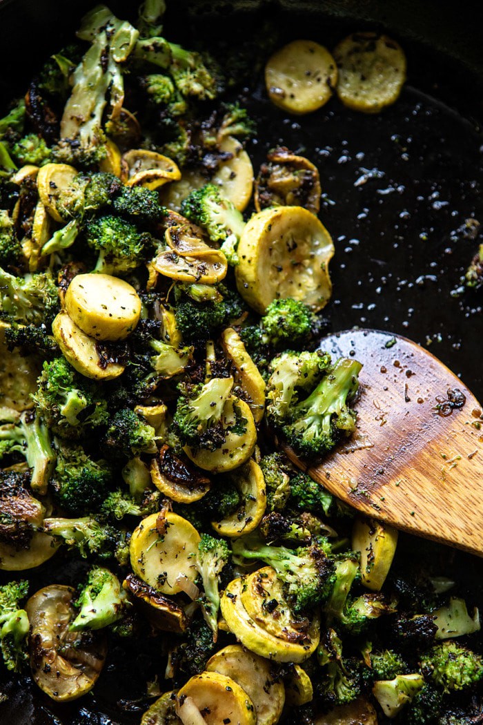 overhead photo of Broccoli and zucchini in skillet after cooking