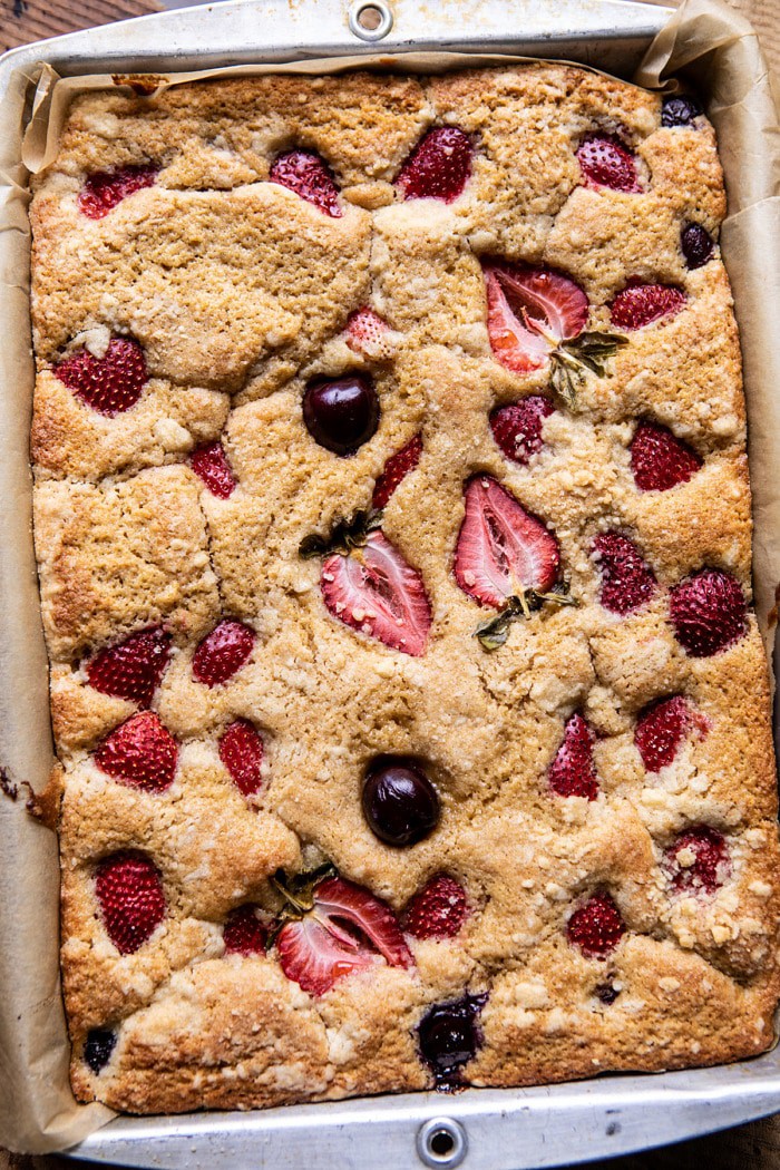 overhead photo of Cherry Strawberry Streusel Cake in baking pan after baking 