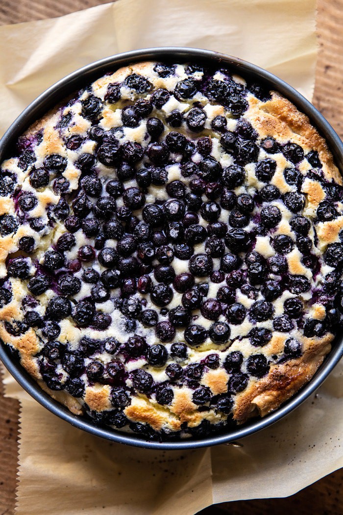 overhead photo of Simple Blueberry Basque Cheesecake in spring form pan after baking