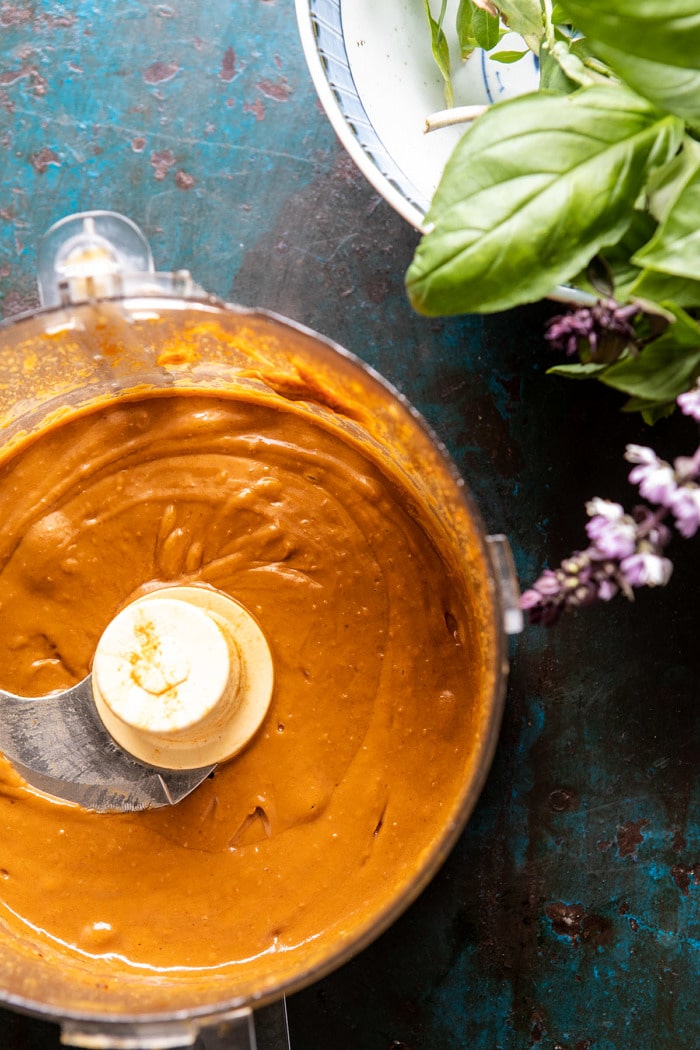 Spicy Peanut Noodles with Chili Garlic Oil | halfbakedharvest.com #peanutnoodles #easyrecipes #dinner #healthy Spicy Peanut sauce in food processor bowl