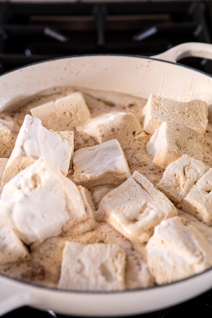 photo of marshmallows melting into browned butter on stove-top