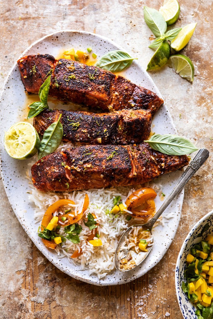 overhead photo of Cilantro Lime Salmon with Mango Salsa with rice on platter 