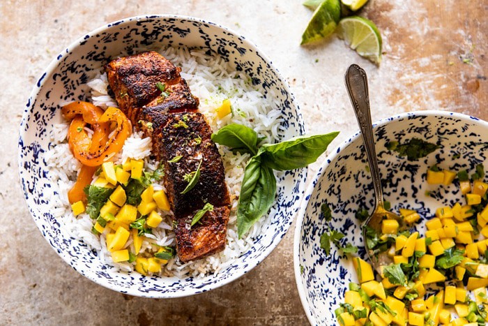 overhead photo Cilantro Lime Salmon with Mango Salsa in bowls of rice 