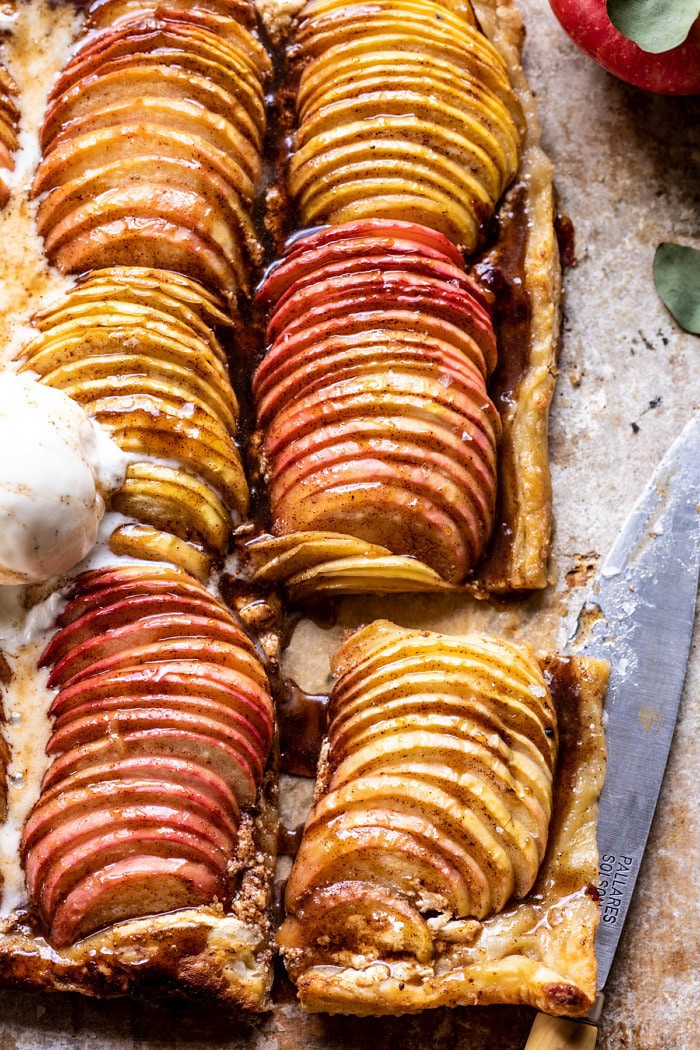 overhead close up photo of Chai Spiced Apple Ricotta Galette with 1 slice cut out