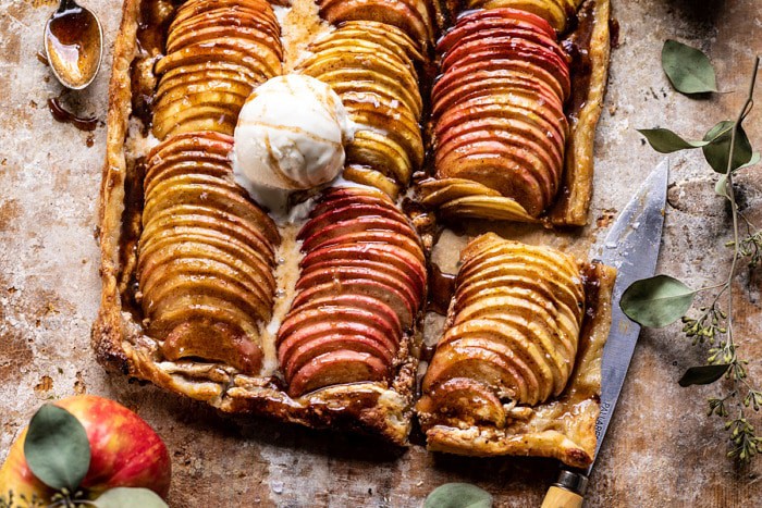 horizontal photo of Chai Spiced Apple Ricotta Galette with one slice cut