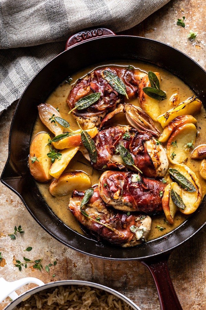 overhead photo of Prosciutto Apple and Sage Butter Chicken with Cider Pan Sauce in skillet