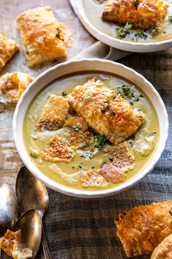 side angled photo of Creamy Broccoli and Butternut Squash Soup with Cheddar Brie Pastries
