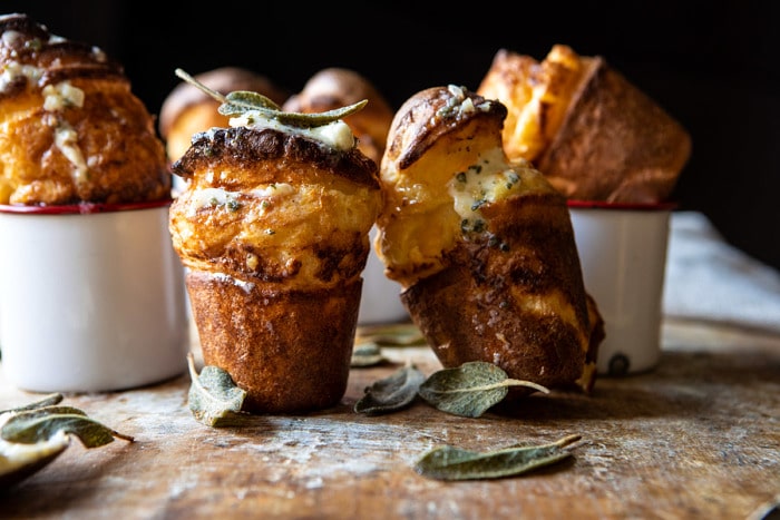 horizontal photo of Parmesan Popovers with Crispy Sage Garlic Butter 