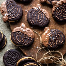 Peanut Butter Stuffed Chocolate Jack-O’-Lantern Cookies | halfbakedharvest.com #peanutbbutter #chocolate #cookies #halloween #thanksgiving