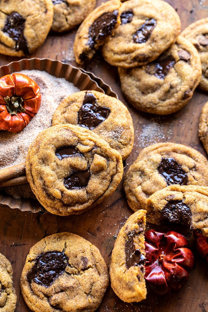 side angled photo of Pumpkin Butter Chocolate Chip Cookies sitting in cinnamon sugar