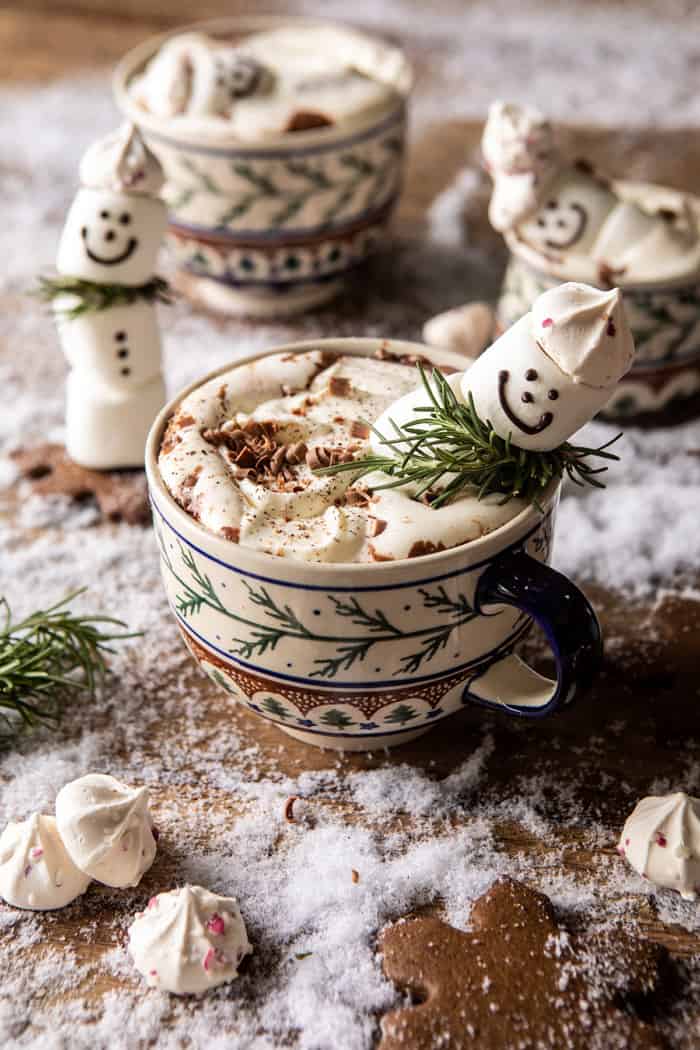 front on photo of Creamy Coconut Hot Chocolate with melting snowman in mug