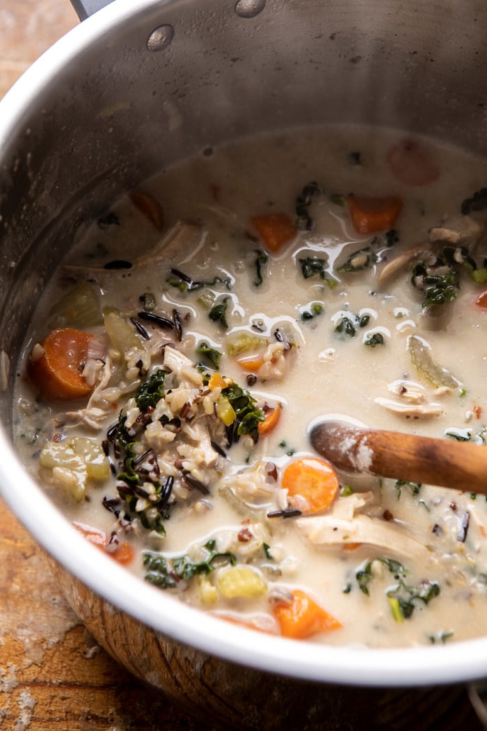 overhead photo of Creamy Wild Rice Chicken Soup in slow cooker after cooking 