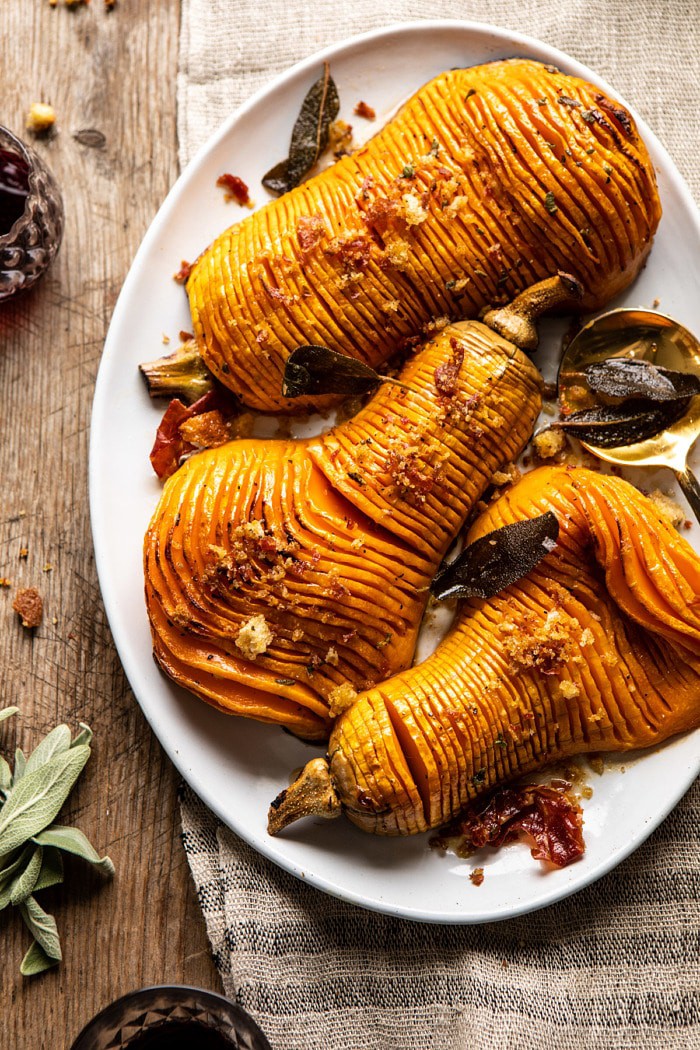 overhead photo of Hasselback Butternut Squash with Sage Butter and Prosciutto Breadcrumbs 