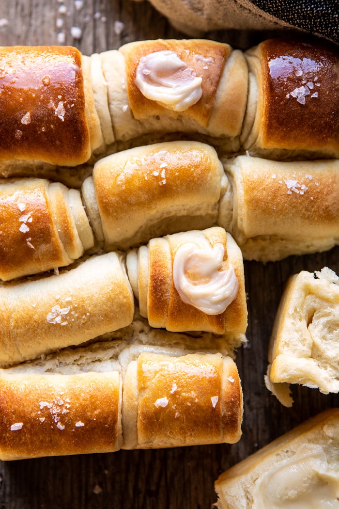 overhead close up photo of Salted Honey Butter Parker House Rolls