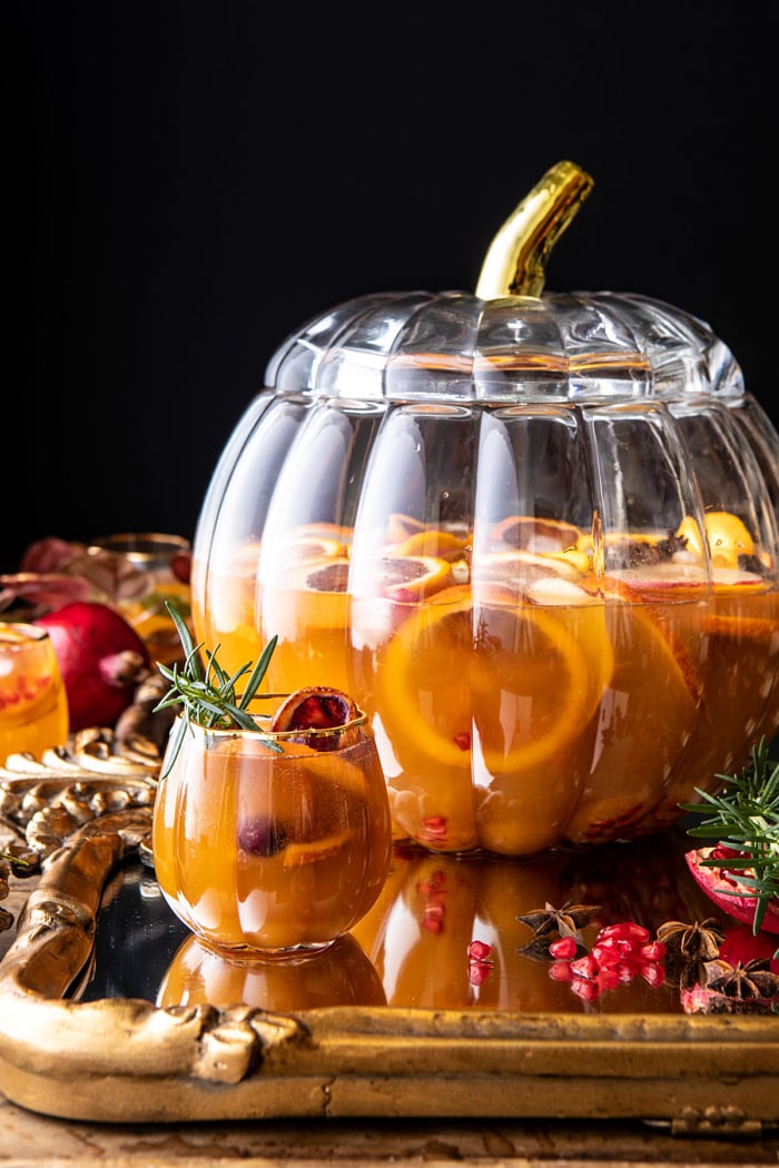 side angled photo of Thanksgiving Sangria | halfbakedharvest.com #thanksgiving #sangria #holiday