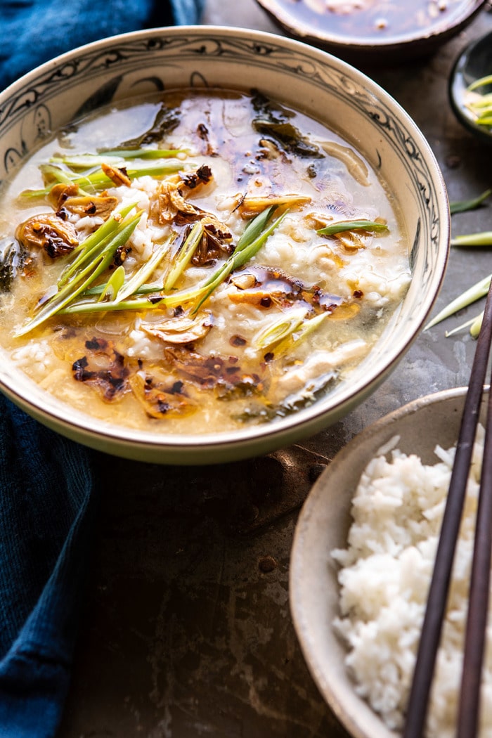 side angle photo of 30 Minute Chinese Egg Drop Chicken Rice Soup with Garlicky Chile Oil