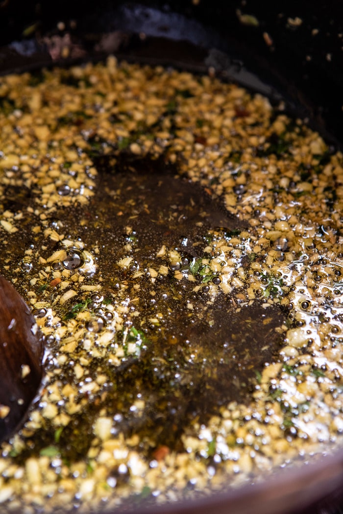 garlic herb oil in large post before adding pasta