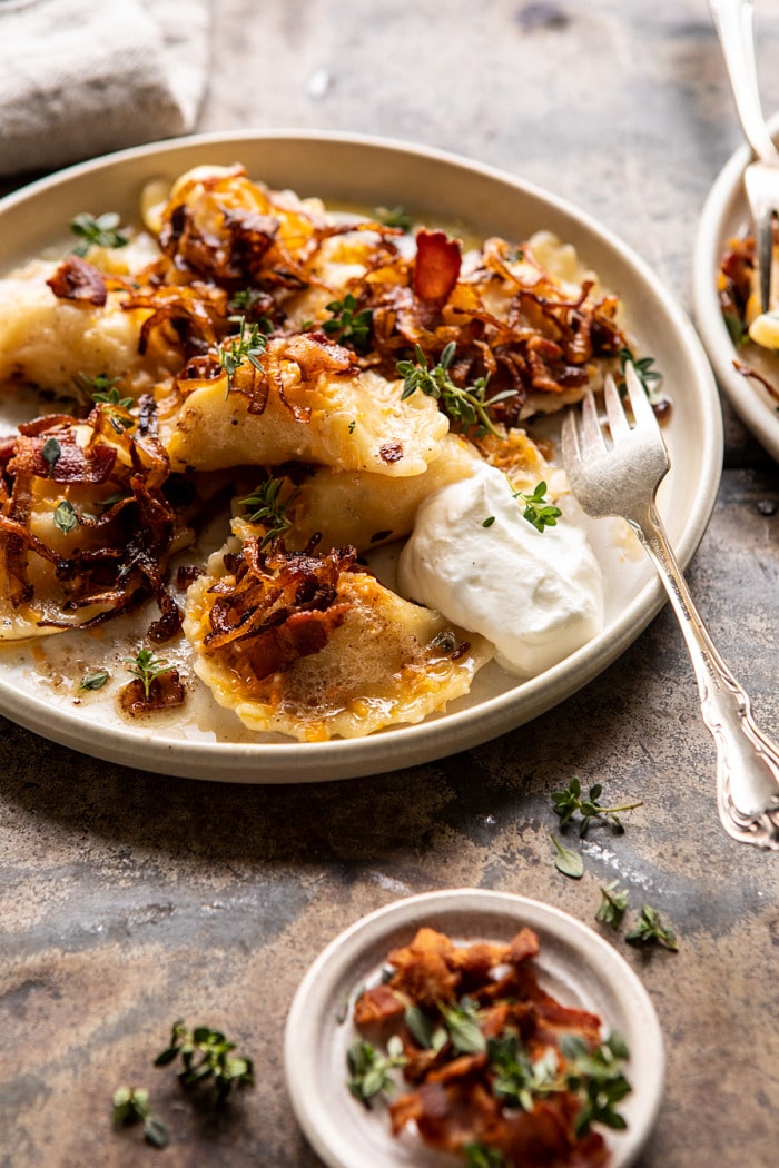 side angled photo of Cheddar Pierogies with Caramelized Onions and Bacon 