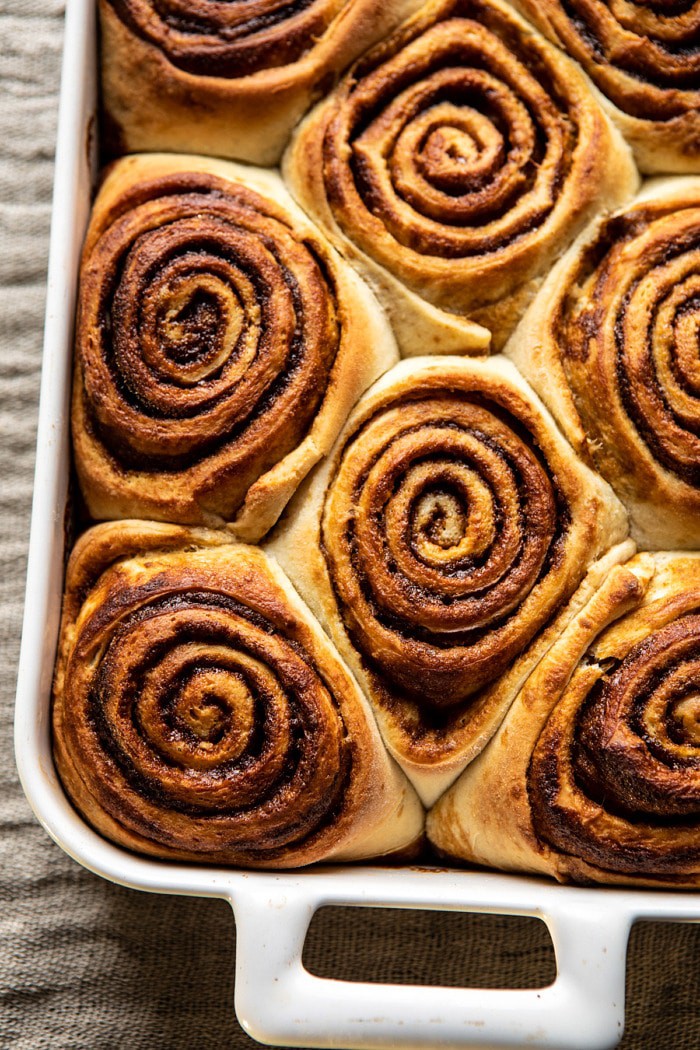 overhead close up photo of Easy Gingerbread Brioche Cinnamon Rolls before adding frosting