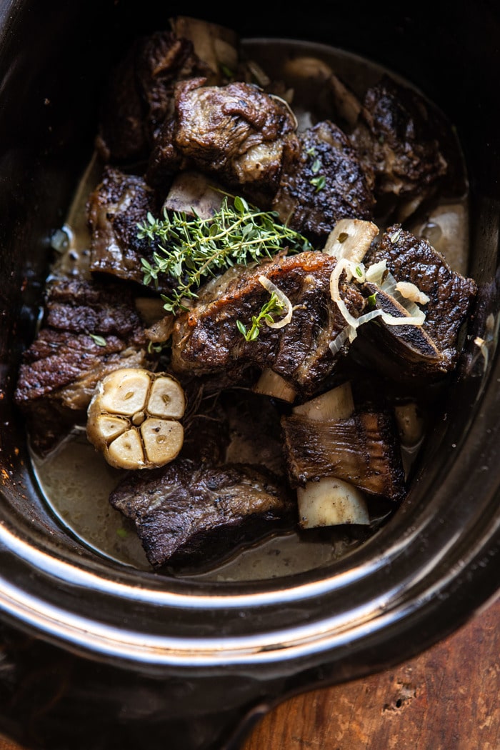 overhead photo of White Wine Braised Short Ribs in crockpot bowl