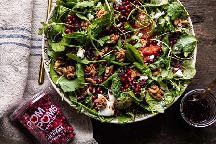 horizontal photo of Winter Pomegranate Salad with Maple Candied Walnuts 