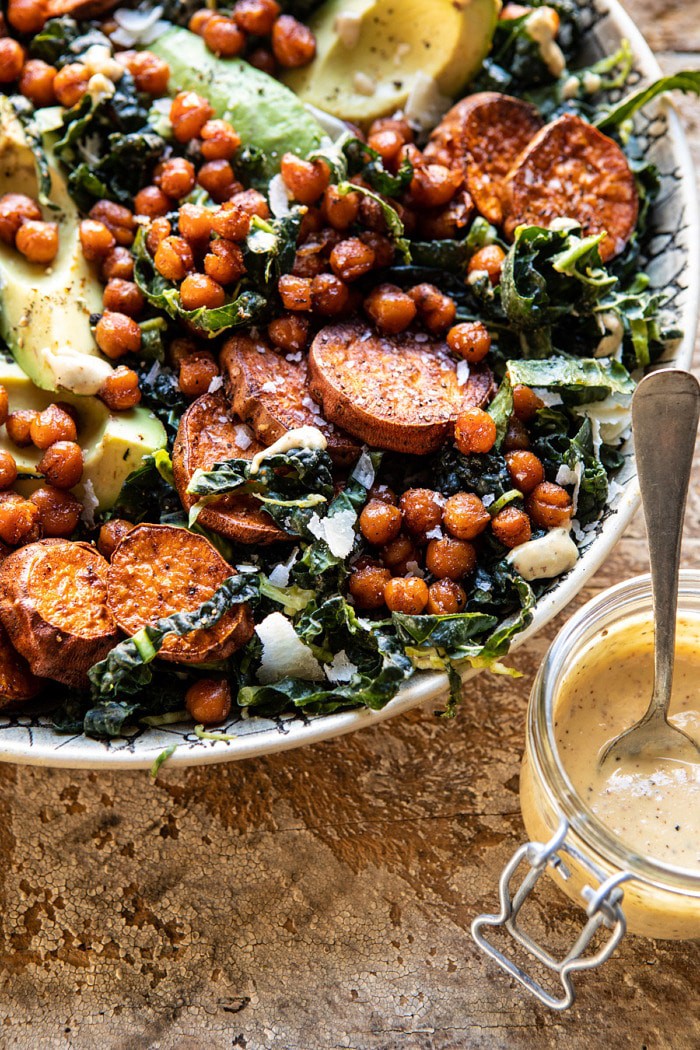 side angled close up photo of Kale Caesar Salad with Sweet Potatoes and Crispy Chickpeas