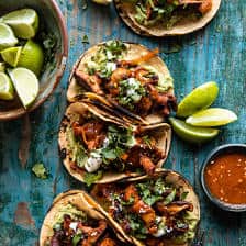 Mushroom Al Pastor Tacos with Garlic Lime Special Sauce | halfbakedharvest.com #vegan #mushrooms #tacos