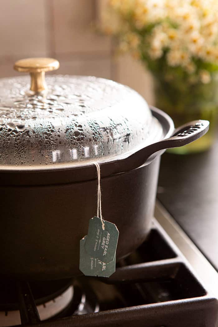 Earl Grey tea steeping in pot on stove