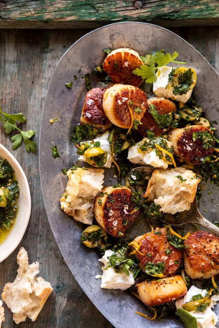 Herbed Garlic Butter Scallops with Lemony Feta Dressing with bread serving plate 